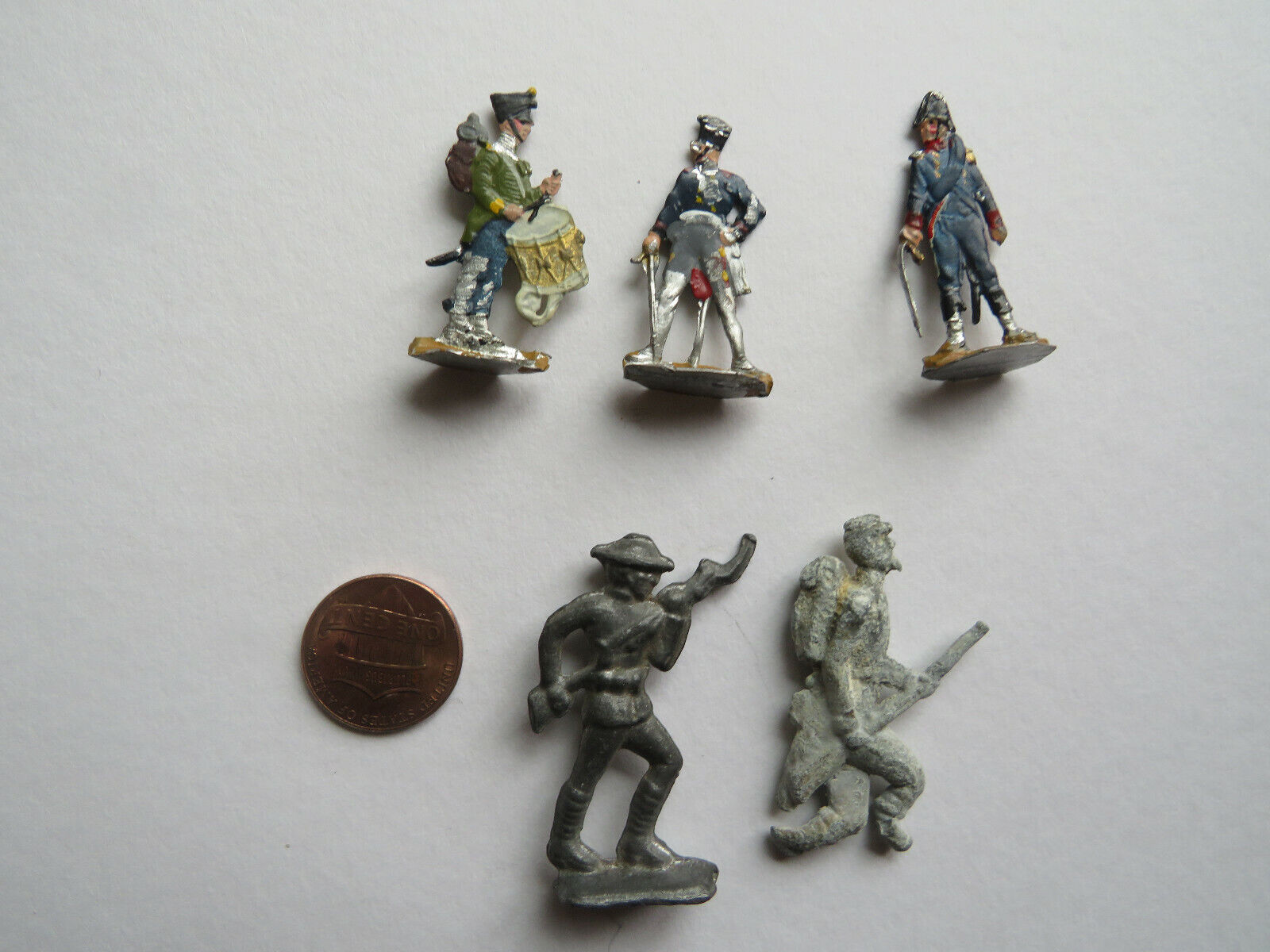 Five Miniature Toy Soldiers